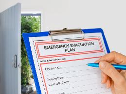 An office assistant with an intellectual disability became upset during emergency evacuation drills and could not remember how to evacuate the building.