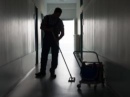 A janitor with cerebral palsy and balance problems was having problems walking about the facility and safely climbing ladders to change light bulbs.
